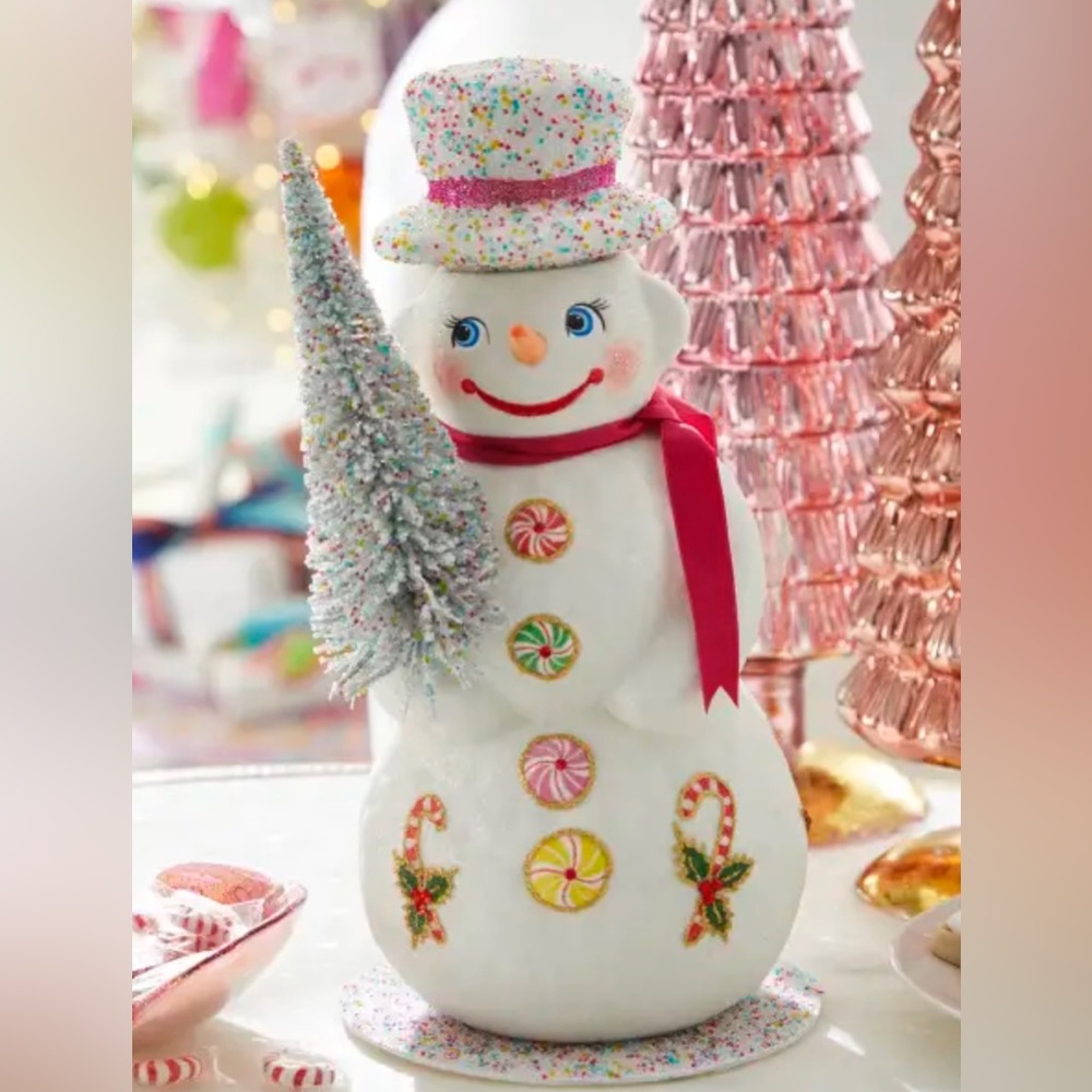 Ino Schaller
Snowman with Red Scarf and Candy Buttons Figurine